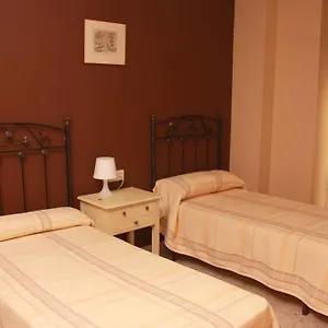 Tilos ** Málaga